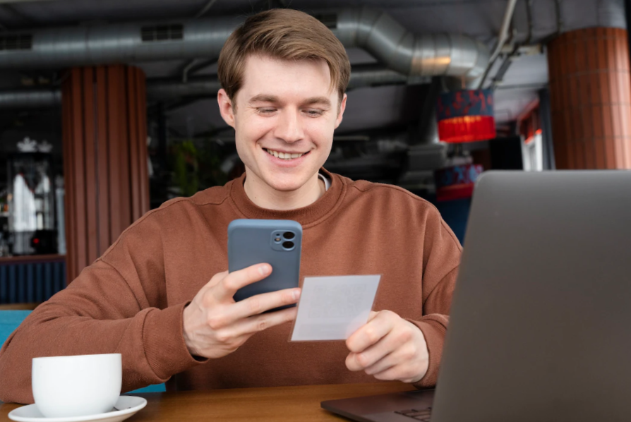 man scanning qr code
