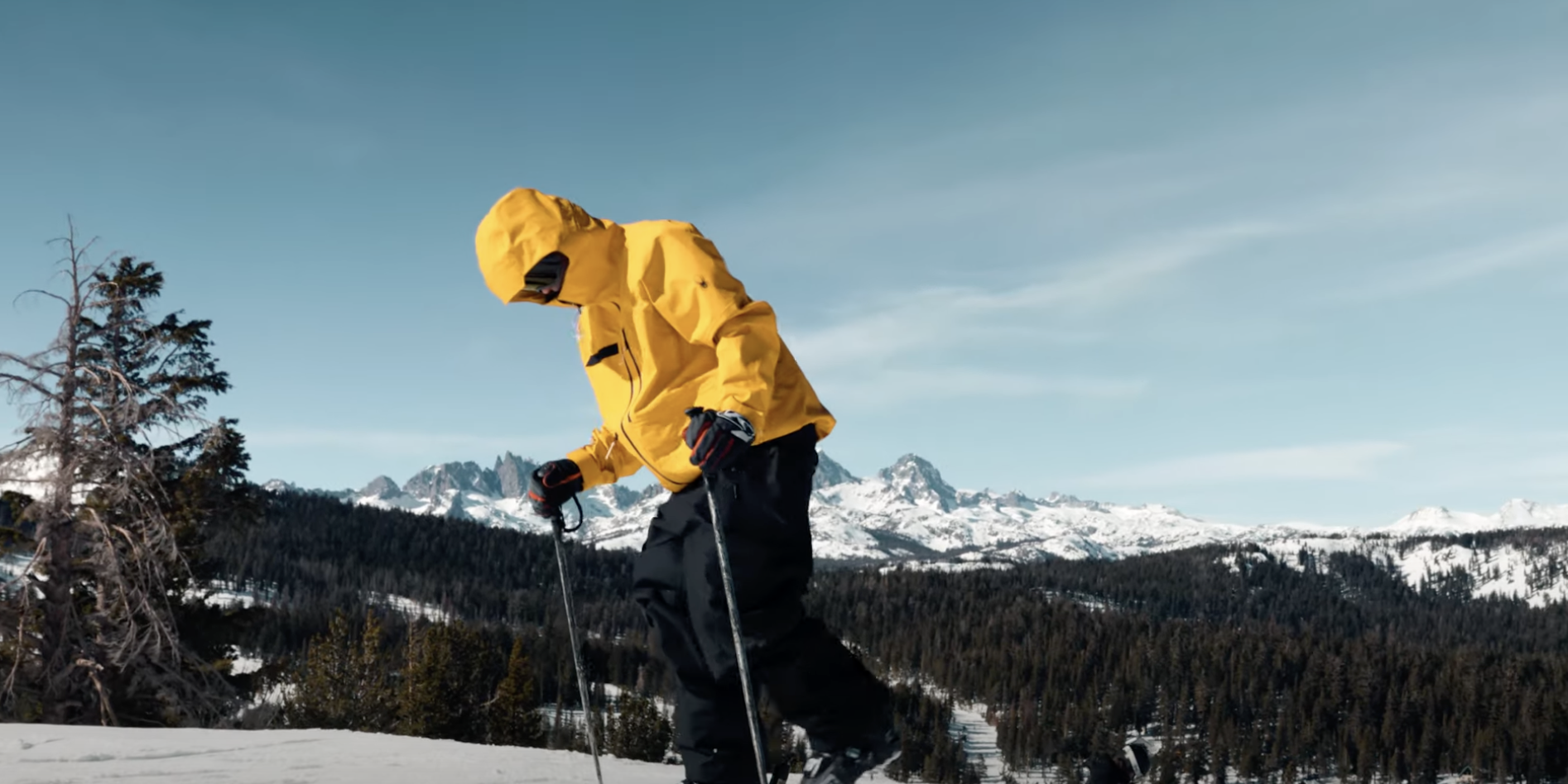 boy skiing with yellow spyd...