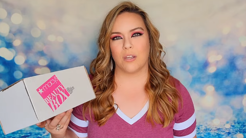 women holding a Macy's beauty box