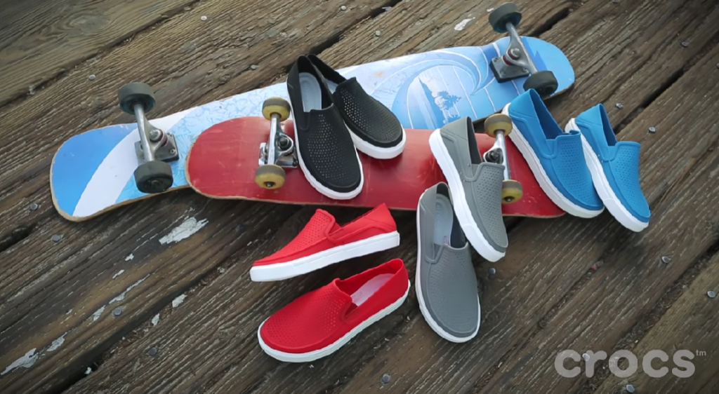 many crocs shoes over 2 skateboards 