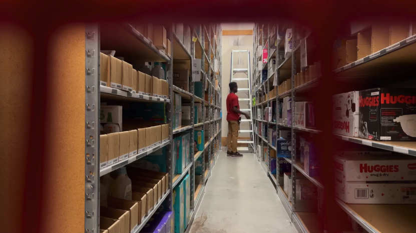 Target worker seen from a distance next to stairs