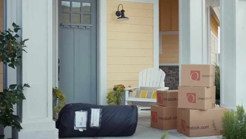 house front porch with many overstock boxes