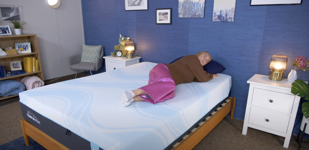 woman sleeping on a tempur pedic mattress