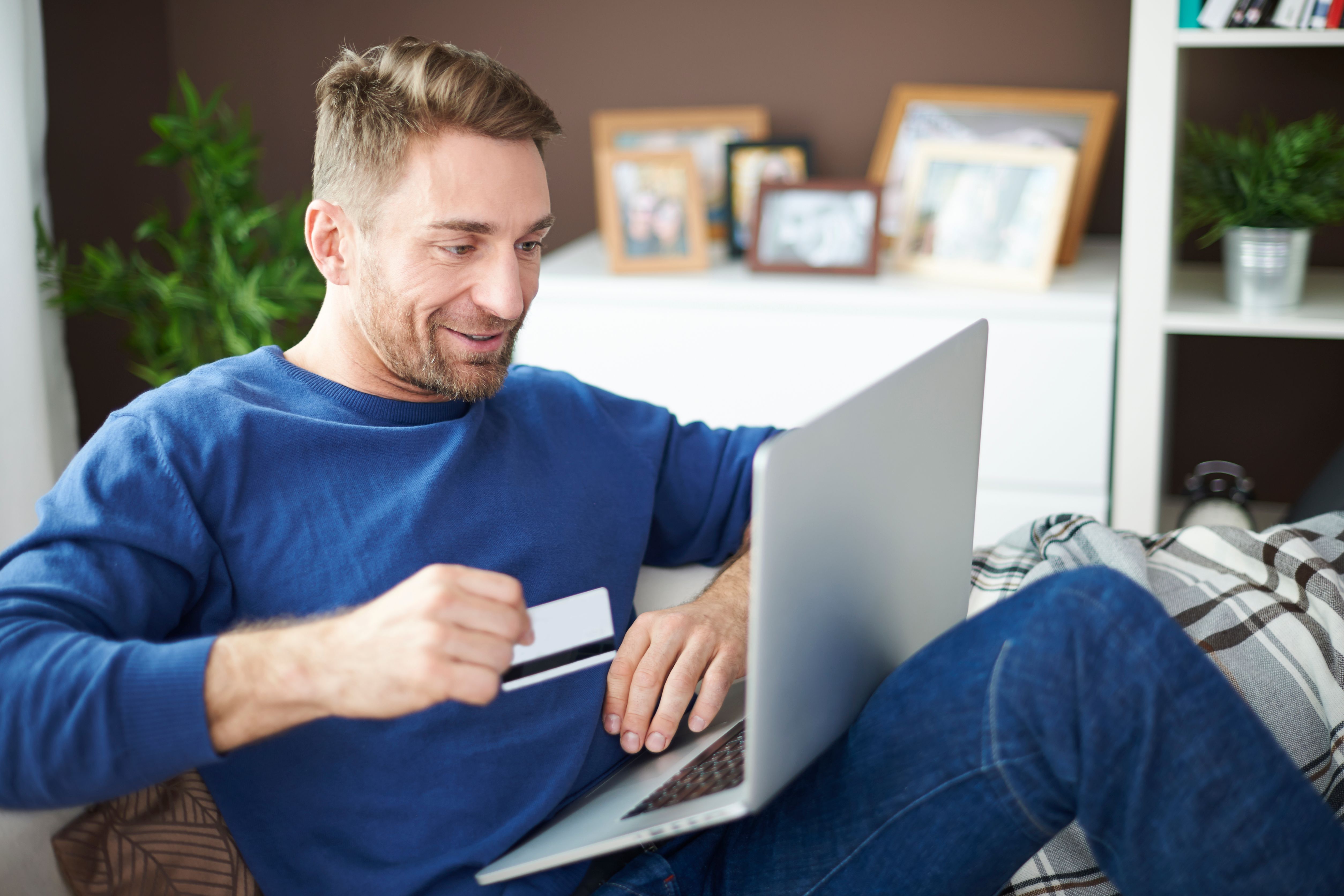 man making an online purcha...