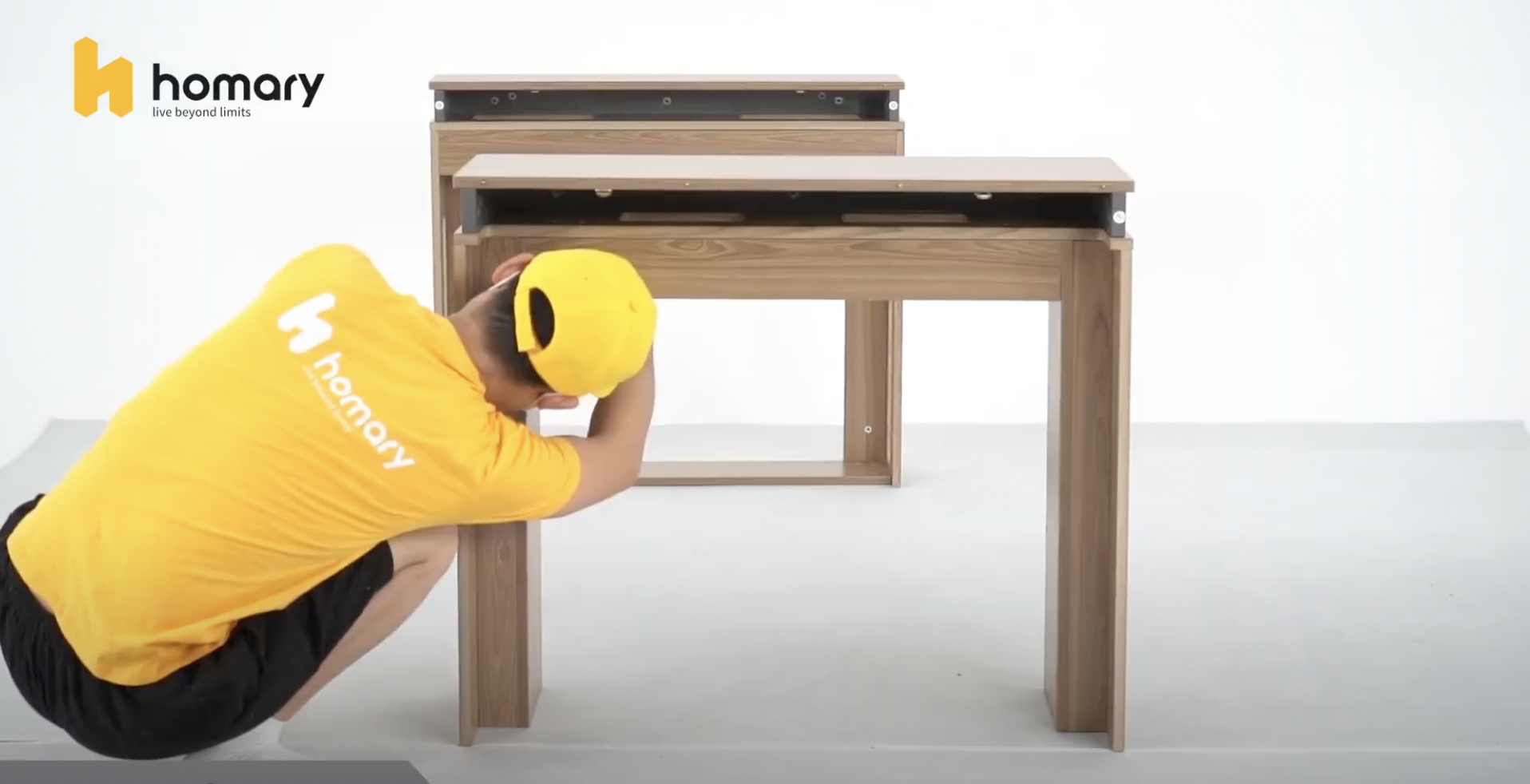 Homary worker checking wooden table