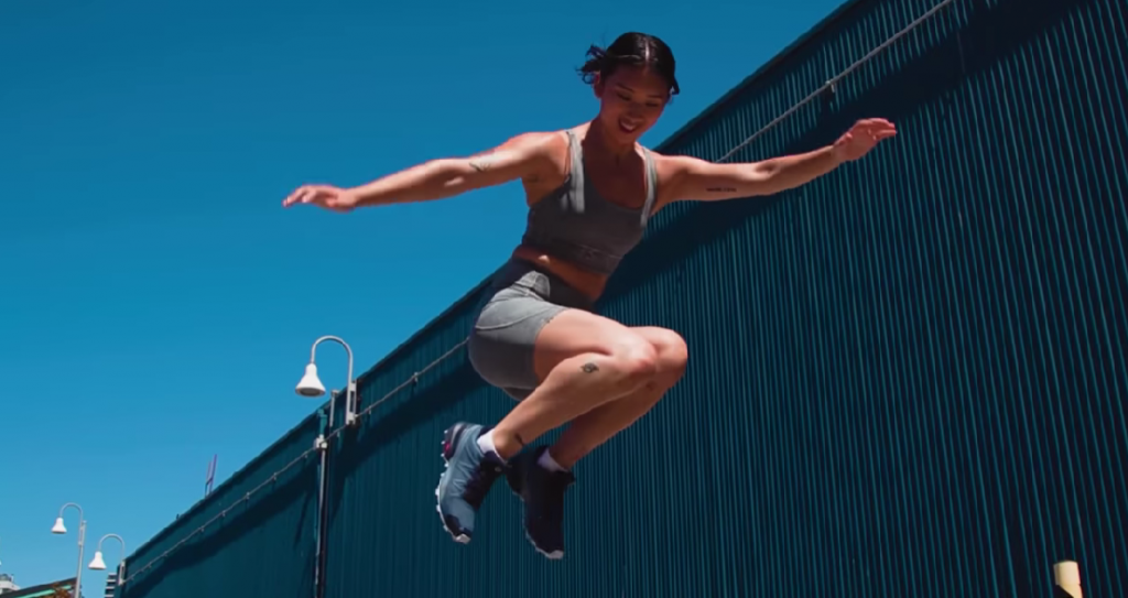 girl jumping with sportwear