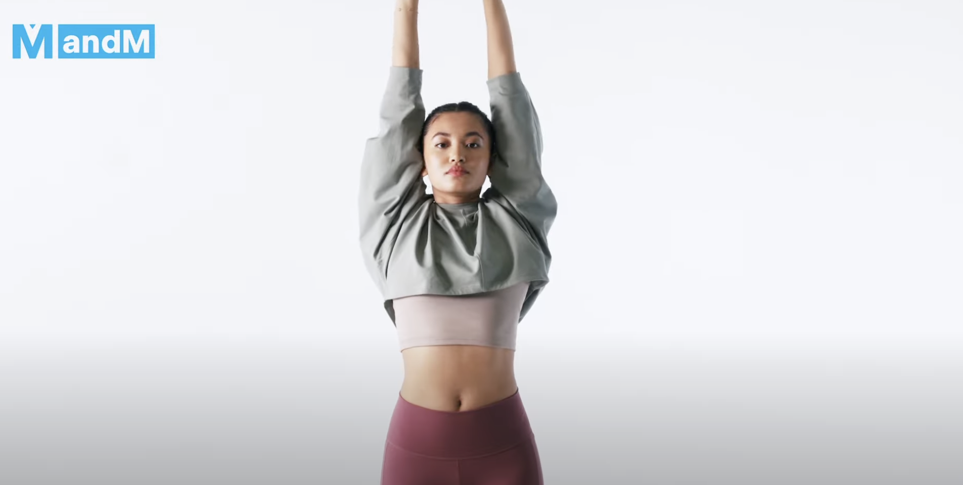 girl stretching her arms up...