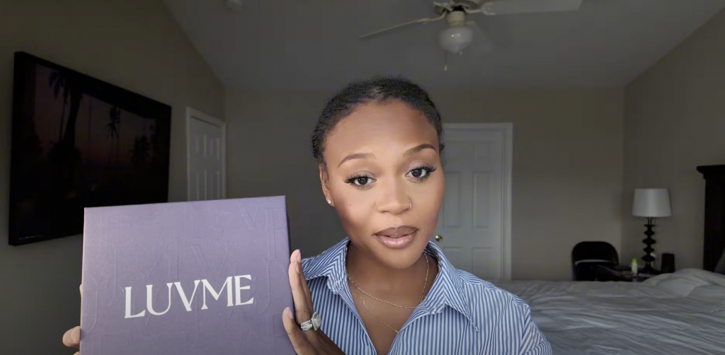 woman showing Luvme product