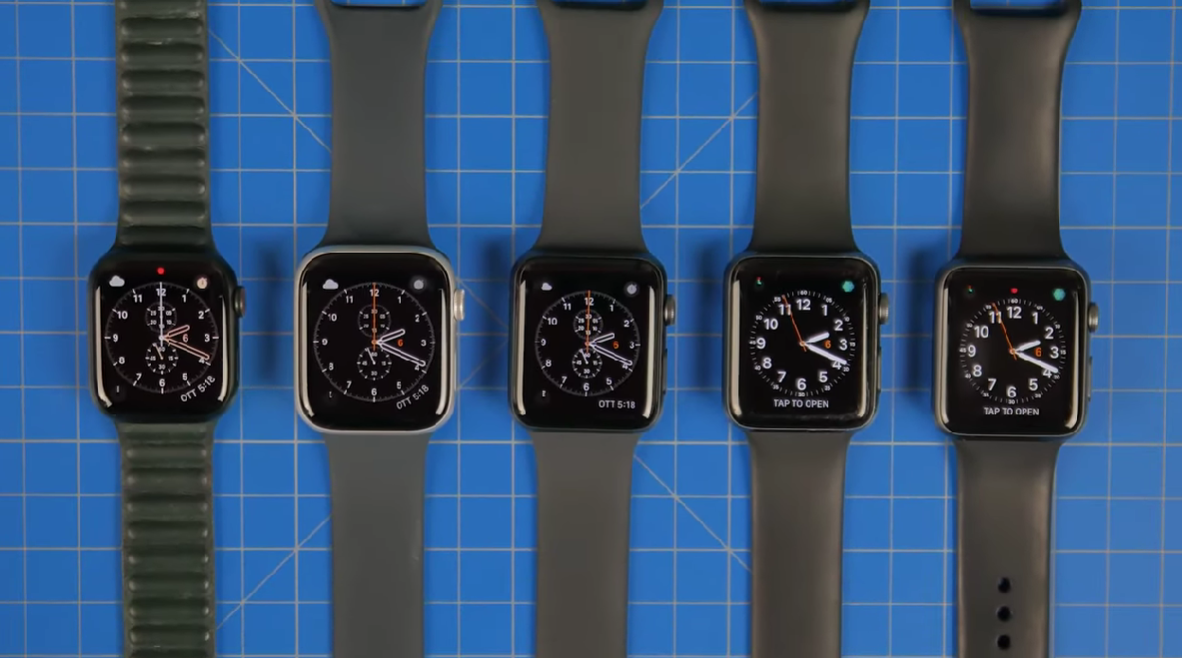5 Apple Watch models on a blue table 