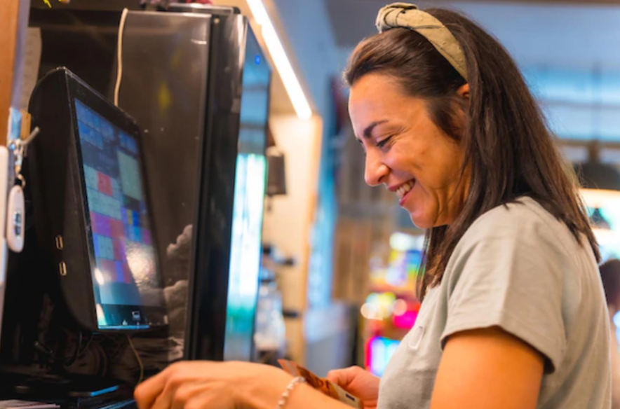 smiling woman using a computer