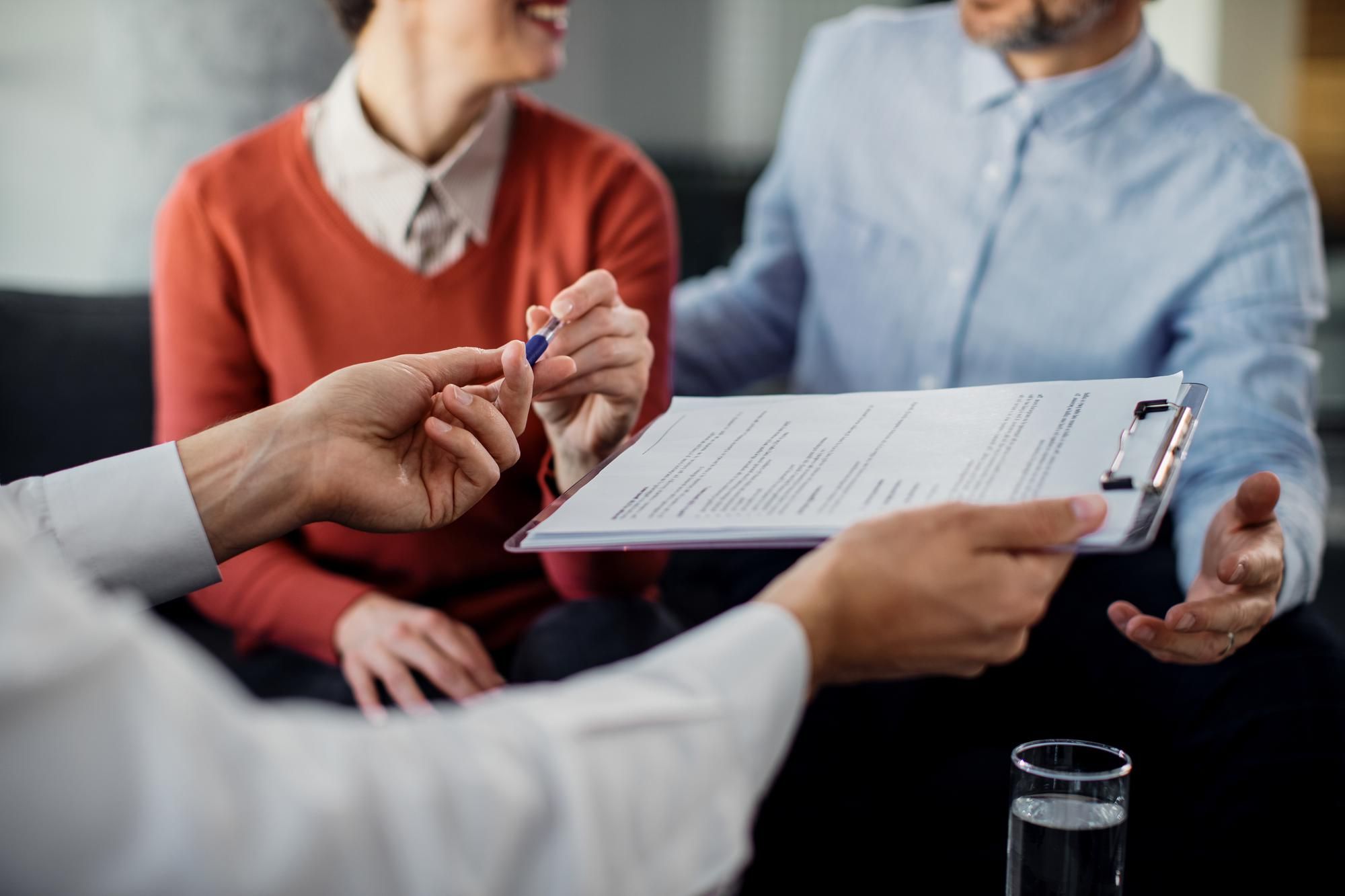 couple purchasing insurance...